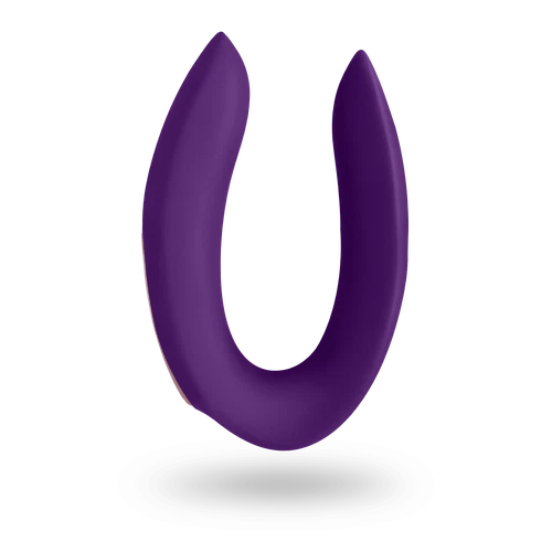 Purple Satisfyer Partner Plus waterproof USB rechargeable remote control with smooth curved design and black background.